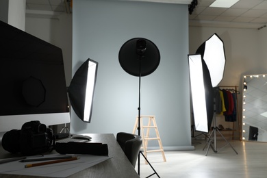 Photo of Interior of modern photo studio with professional equipment