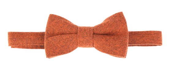Photo of Stylish orange bow tie isolated on white, top view