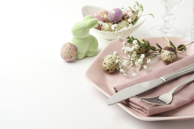 Photo of Festive Easter table setting with beautiful floral decor. Space for text