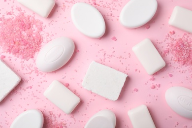 Photo of Flat lay composition with different soap bars on color background