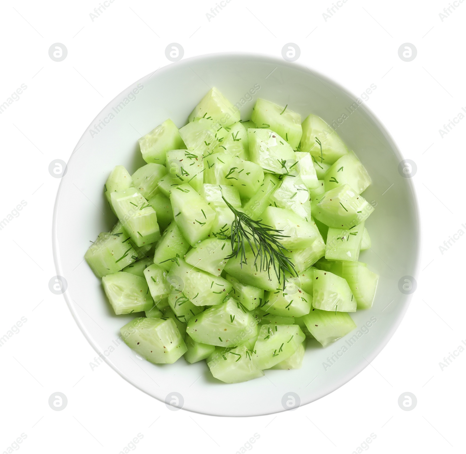 Photo of Delicious cucumber salad with dill in bowl on white background, top view