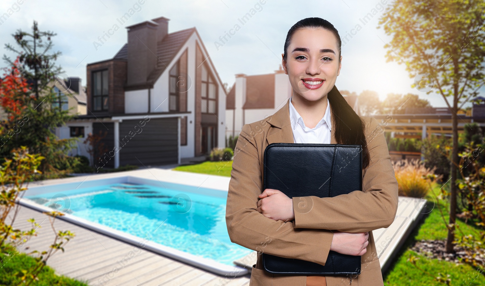 Image of Smiling real estate agent with portfolio outdoors, space for text. Beautiful house, garden and pool on sunny day