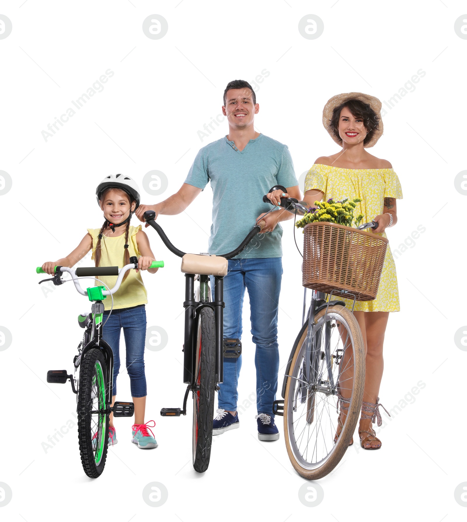 Photo of Portrait of parents and their daughter with bicycles on white background