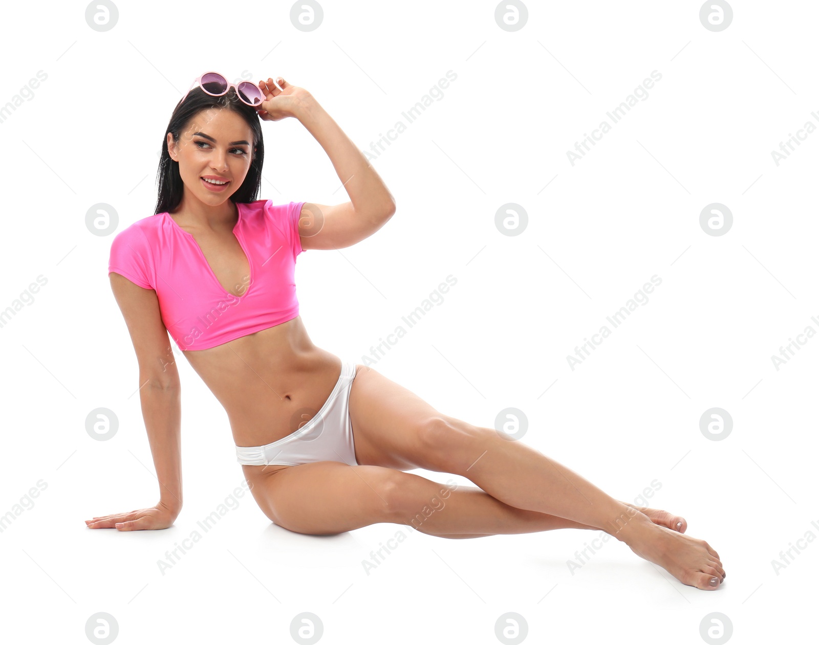 Photo of Beautiful young woman in stylish bikini with sunglasses on white background