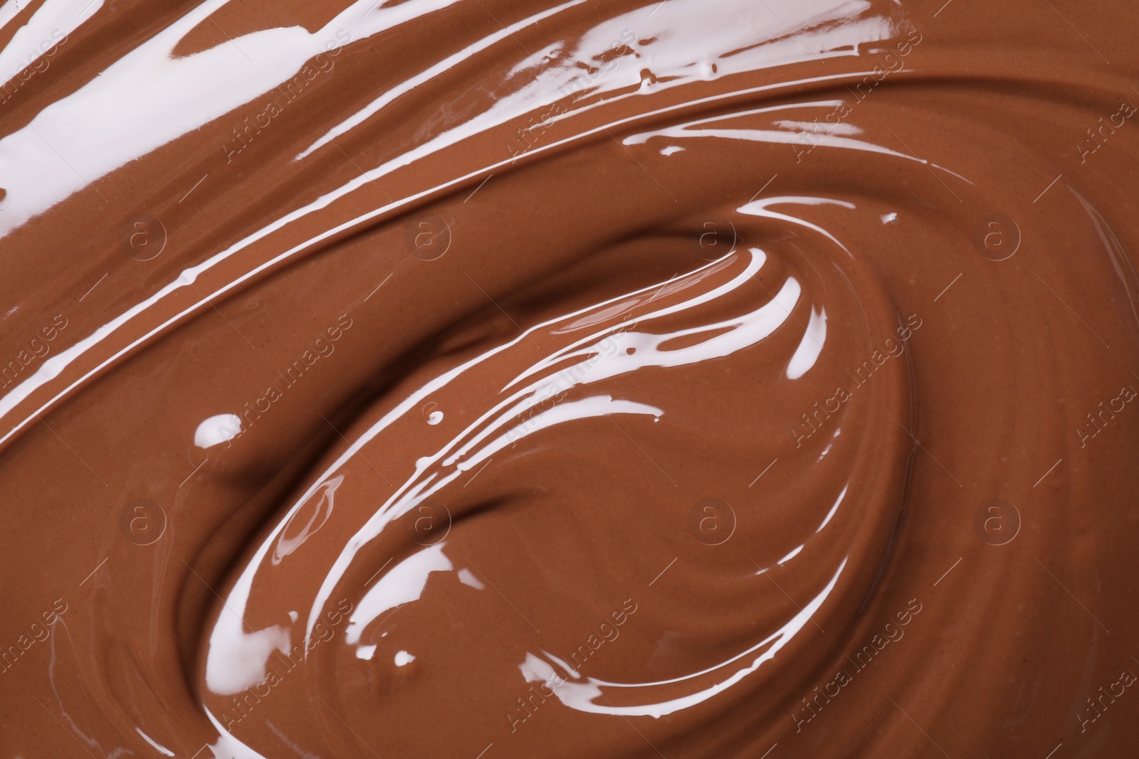 Photo of Tasty chocolate paste as background, closeup view