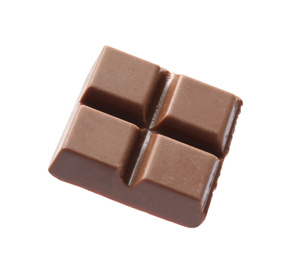 Piece of delicious milk chocolate isolated on white