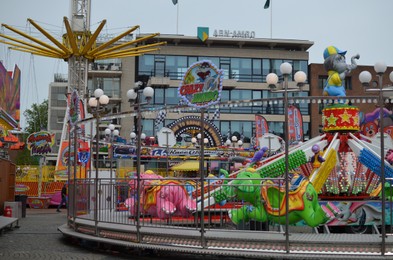 GRONINGEN, NETHERLANDS - MAY 20, 2022: Carousel attraction in outdoor amusement park