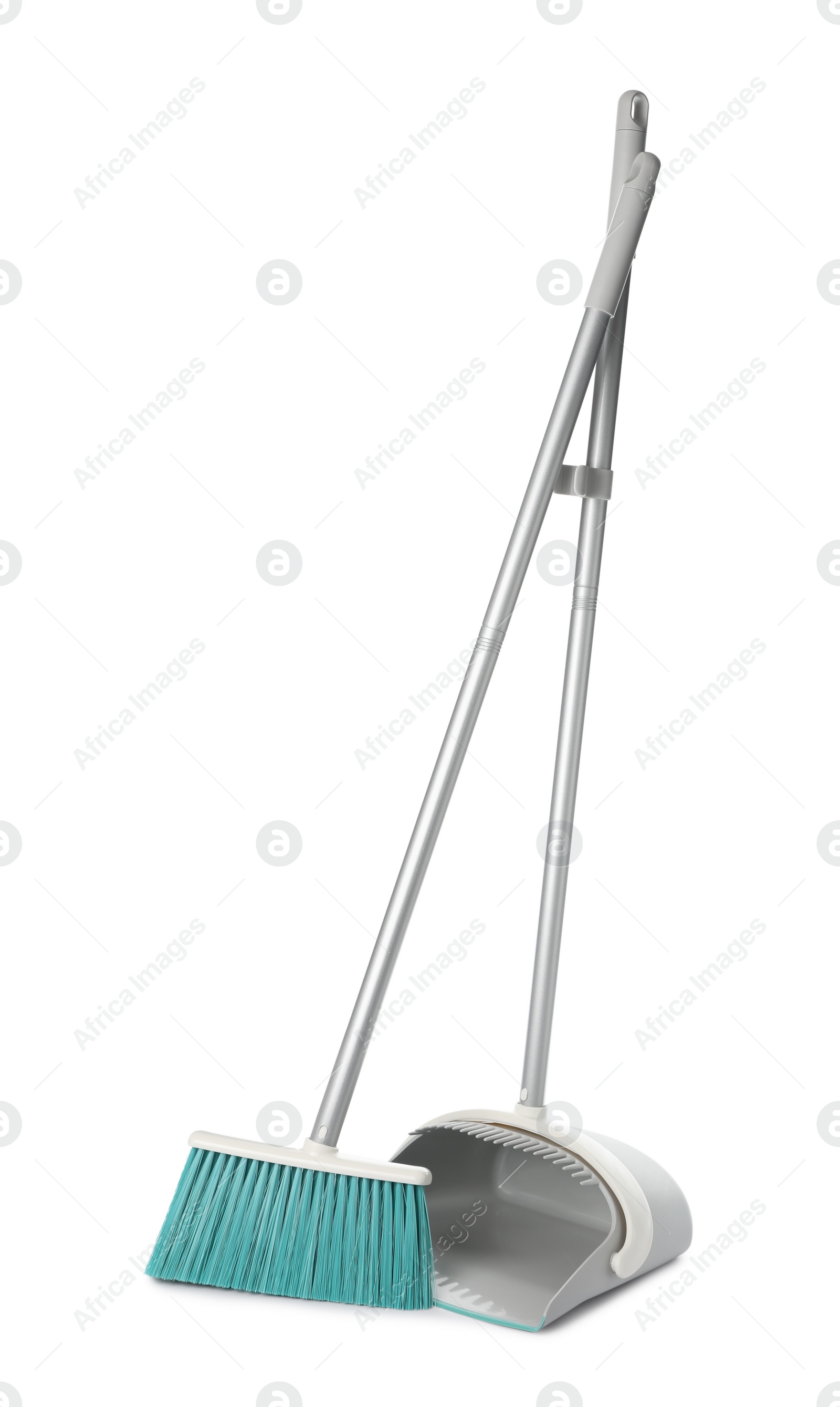 Photo of Plastic broom and dustpan on white background