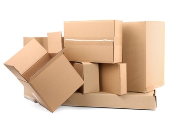 Photo of Pile of cardboard boxes on white background