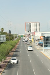 SAN PEDRO GARZA GARCIA, MEXICO - AUGUST 29, 2022: Blurred view of cars in traffic jam on city street