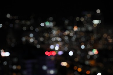 Blurred view of cityscape at night. Bokeh effect