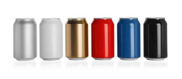 Set of aluminum cans with drinks on white background