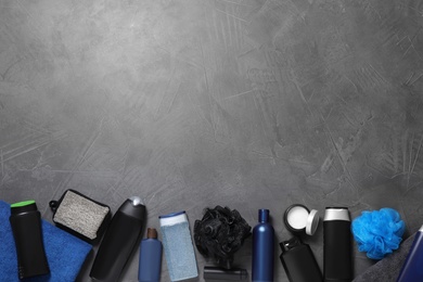 Flat lay composition with men's personal hygiene products on grey background. Space for text