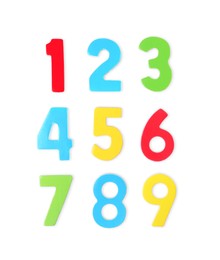 Photo of Colorful numbers on white background, top view