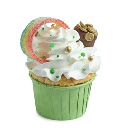 Photo of St. Patrick's day party. Tasty cupcake with sour rainbow belt and pot of gold toppers isolated on white