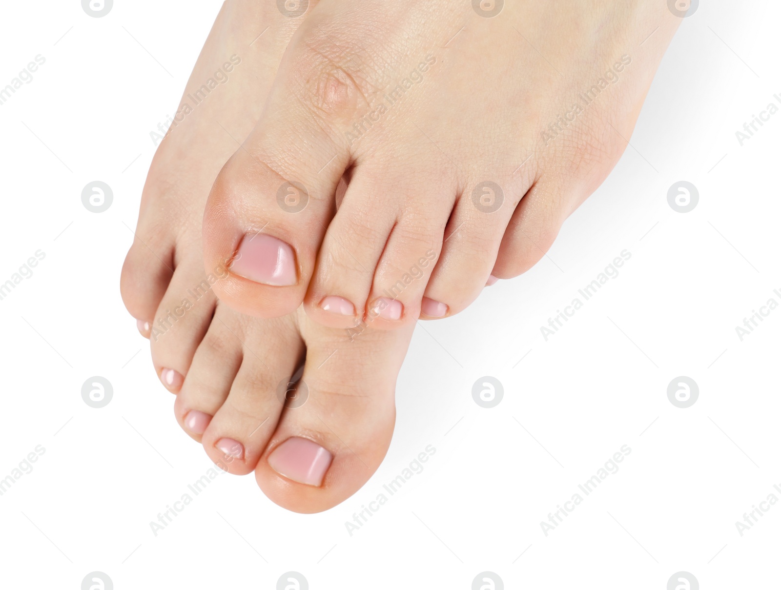 Photo of Woman with neat toenails after pedicure procedure isolated on white, closeup