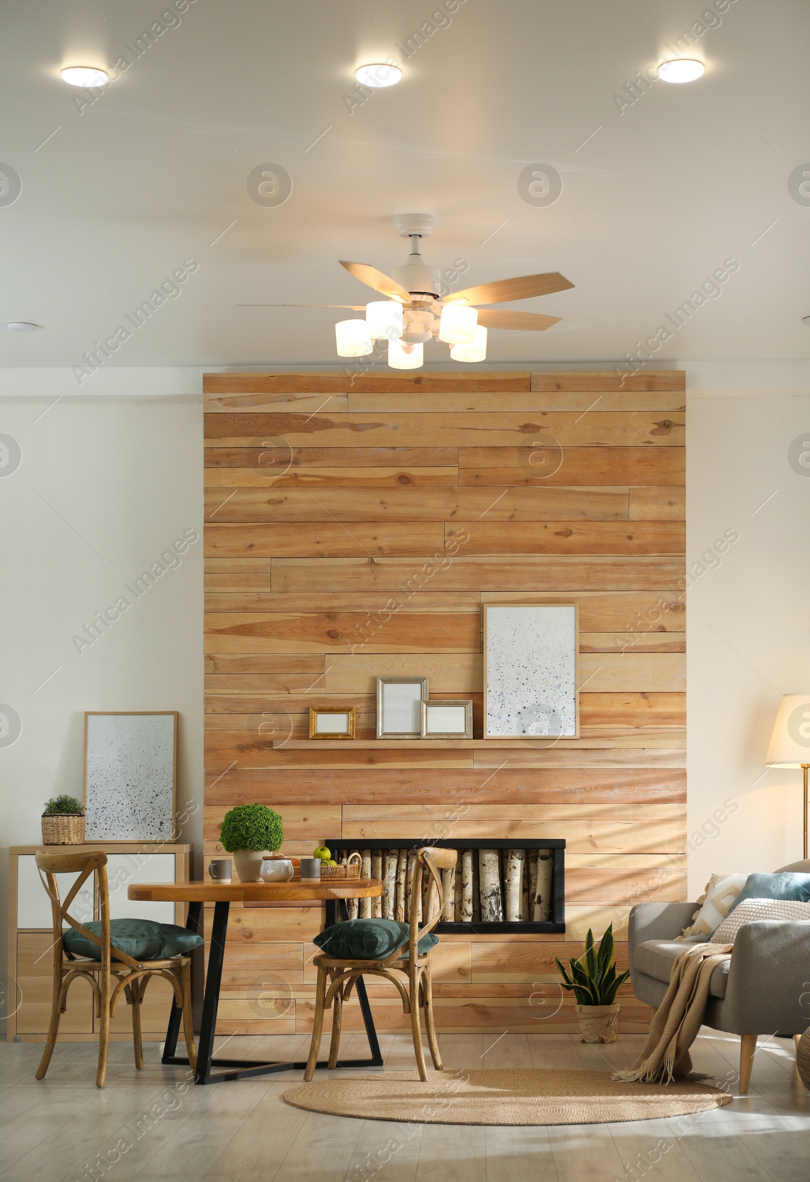 Photo of Stylish living room interior with modern ceiling fan