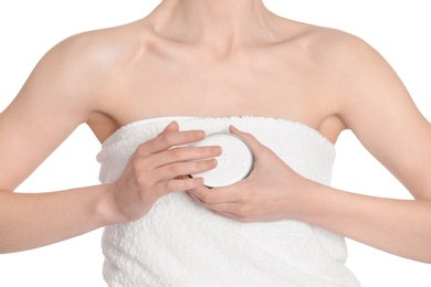 Photo of Young woman with jar of hand cream on white background, closeup