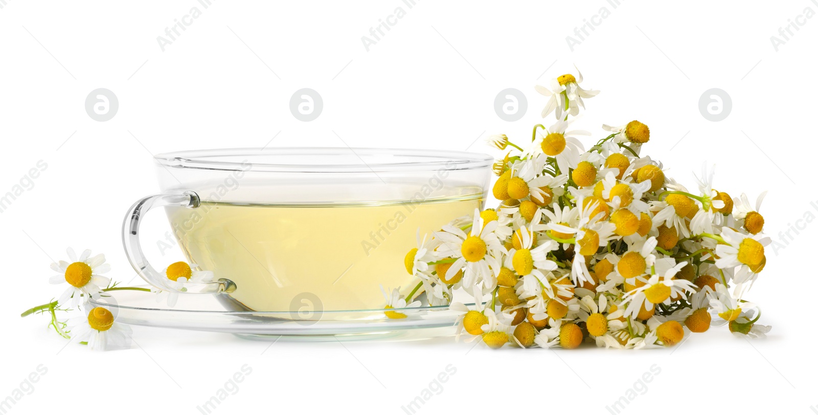 Photo of Aromatic herbal tea in glass cup with chamomile flowers isolated on white