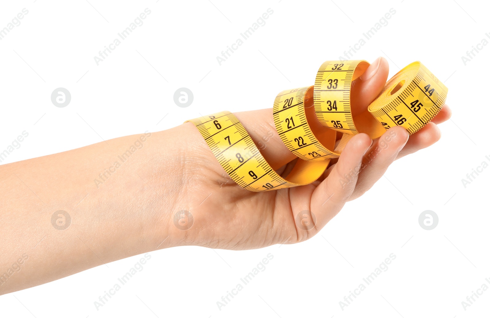 Photo of Woman holding yellow measuring tape on white background, closeup