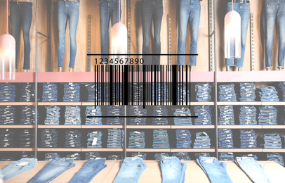 Image of Barcode and collection of stylish jeans on display in wholesale shop