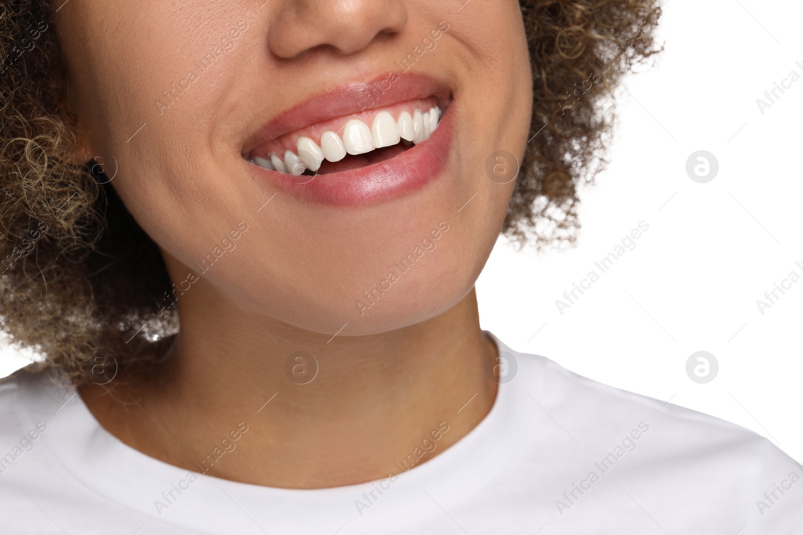 Photo of Woman with clean teeth smiling on white background, closeup