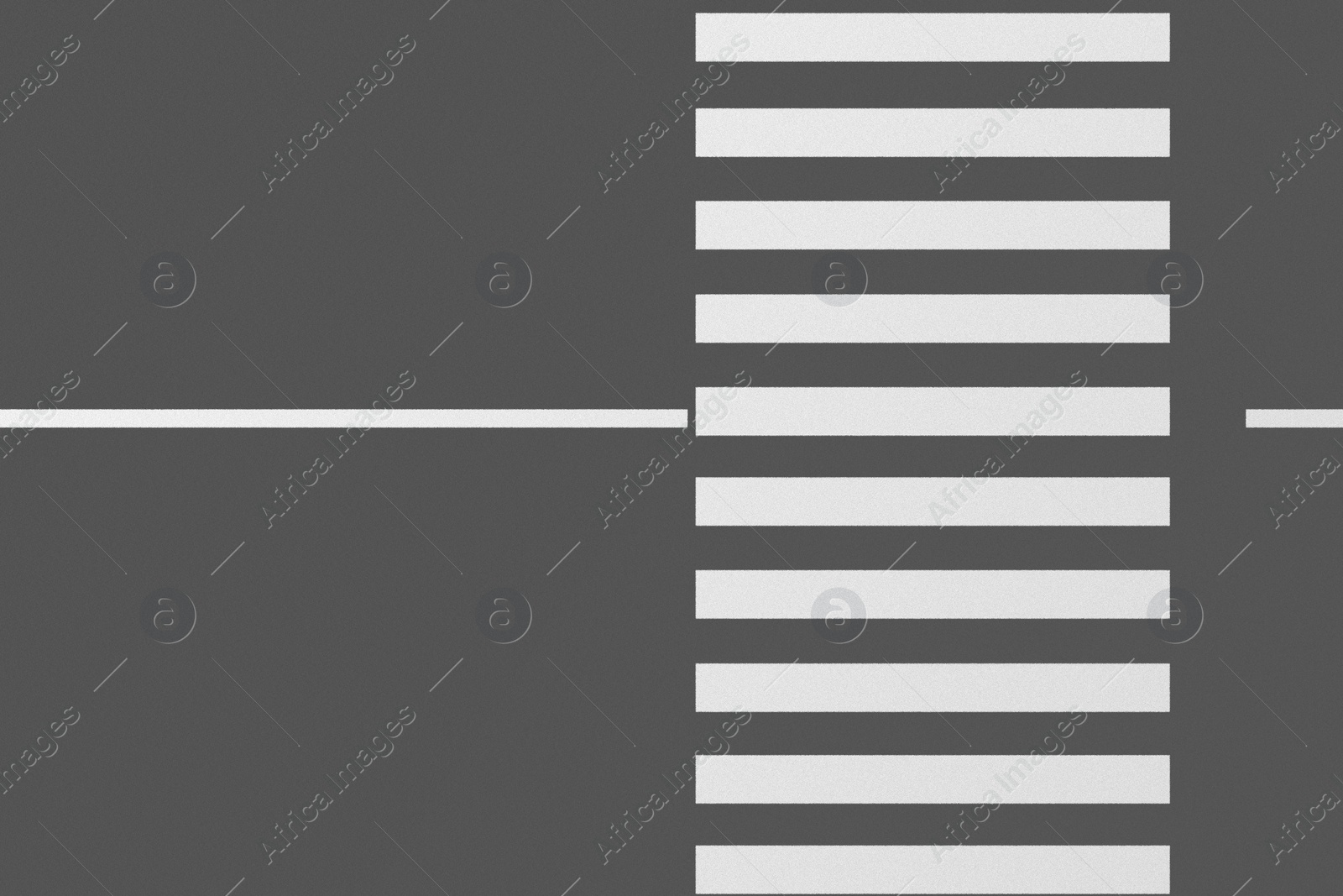 Image of White pedestrian crossing on empty city street, top view