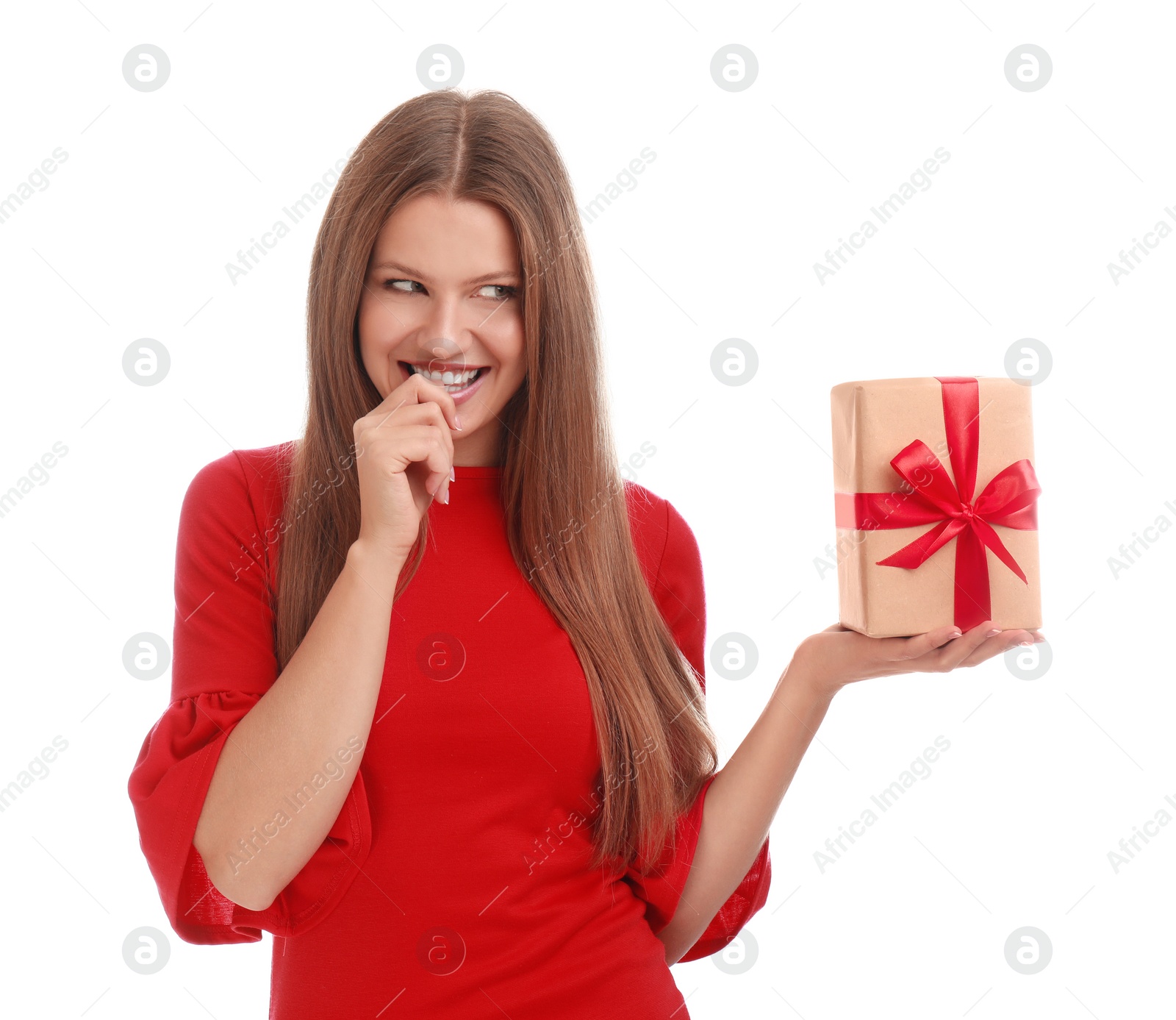 Photo of Emotional young woman with Christmas gift on white background