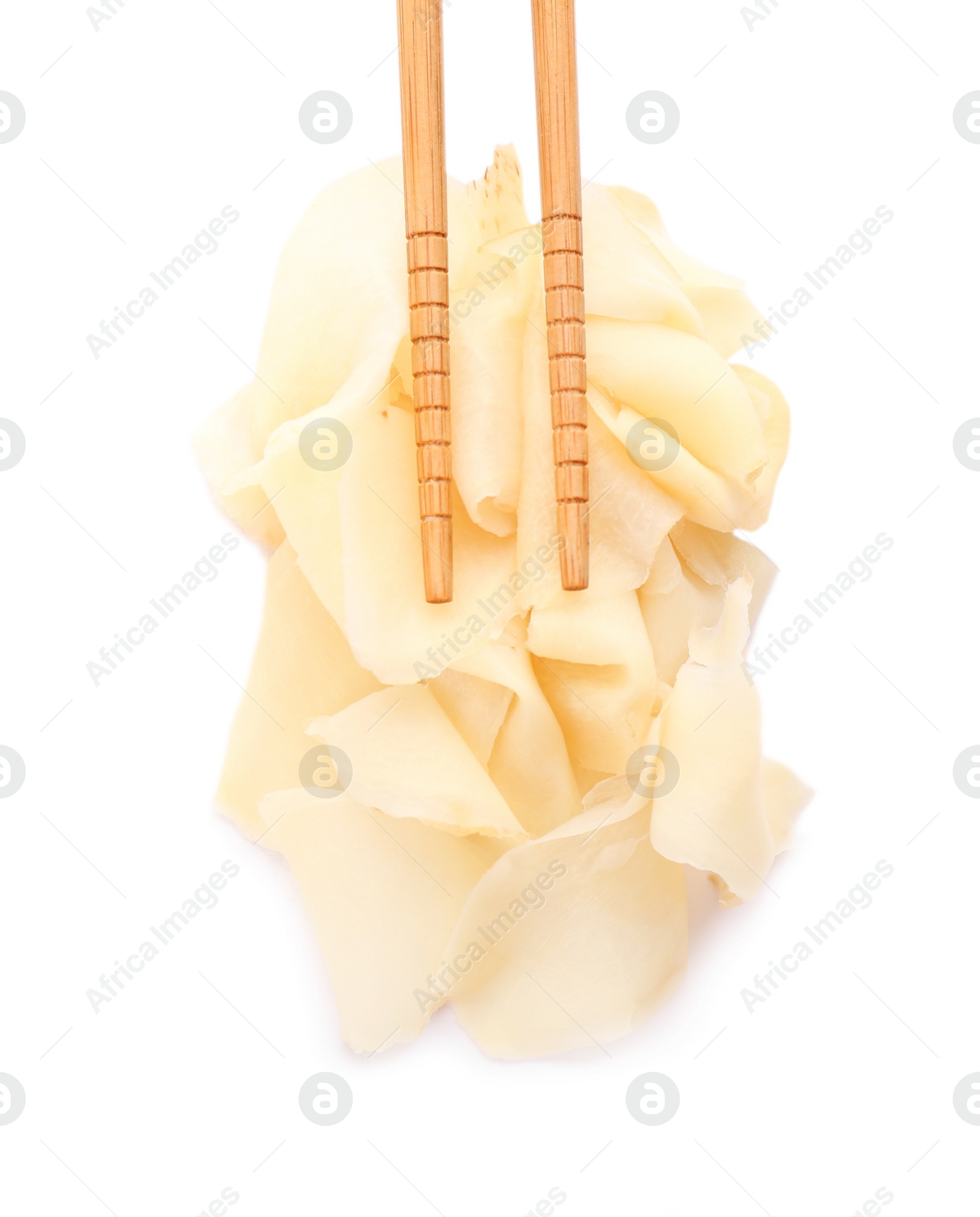 Photo of Chopsticks with pickled ginger on white background, top view