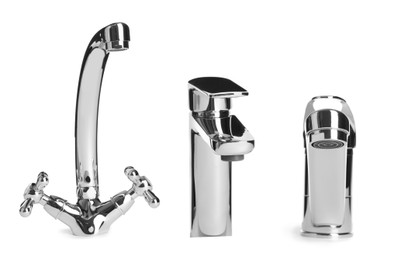 Image of Set with new water faucets on white background