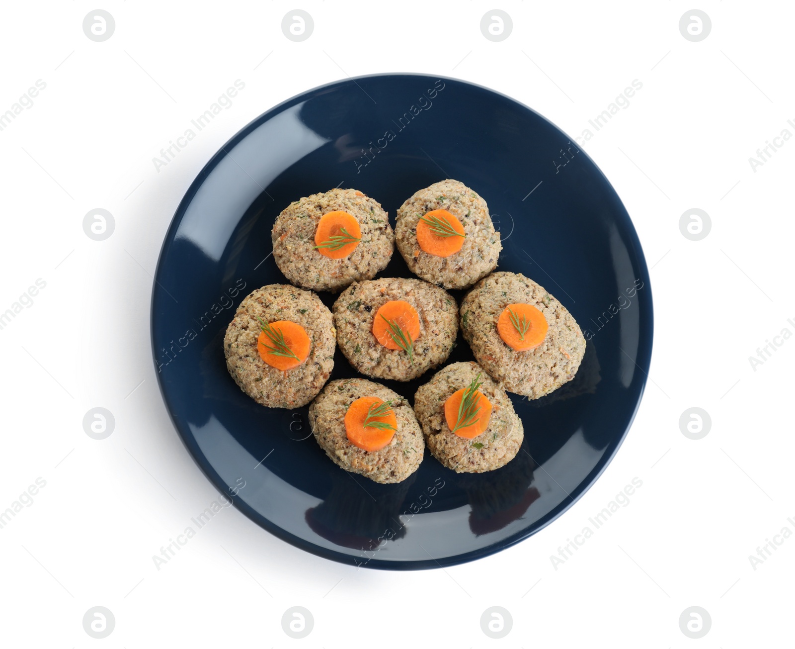 Photo of Plate of traditional Passover (Pesach) gefilte fish isolated on white, top view