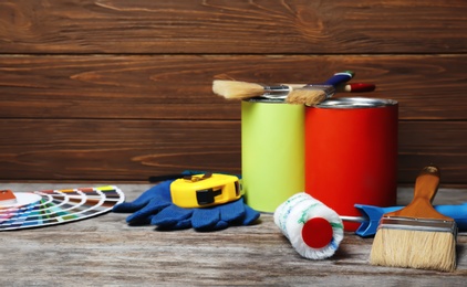 Photo of Set of decorator's tools on wooden table