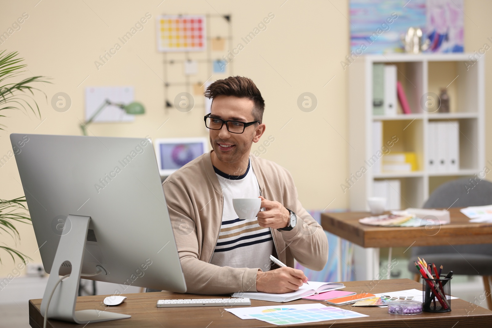 Photo of Professional interior designer at workplace in office