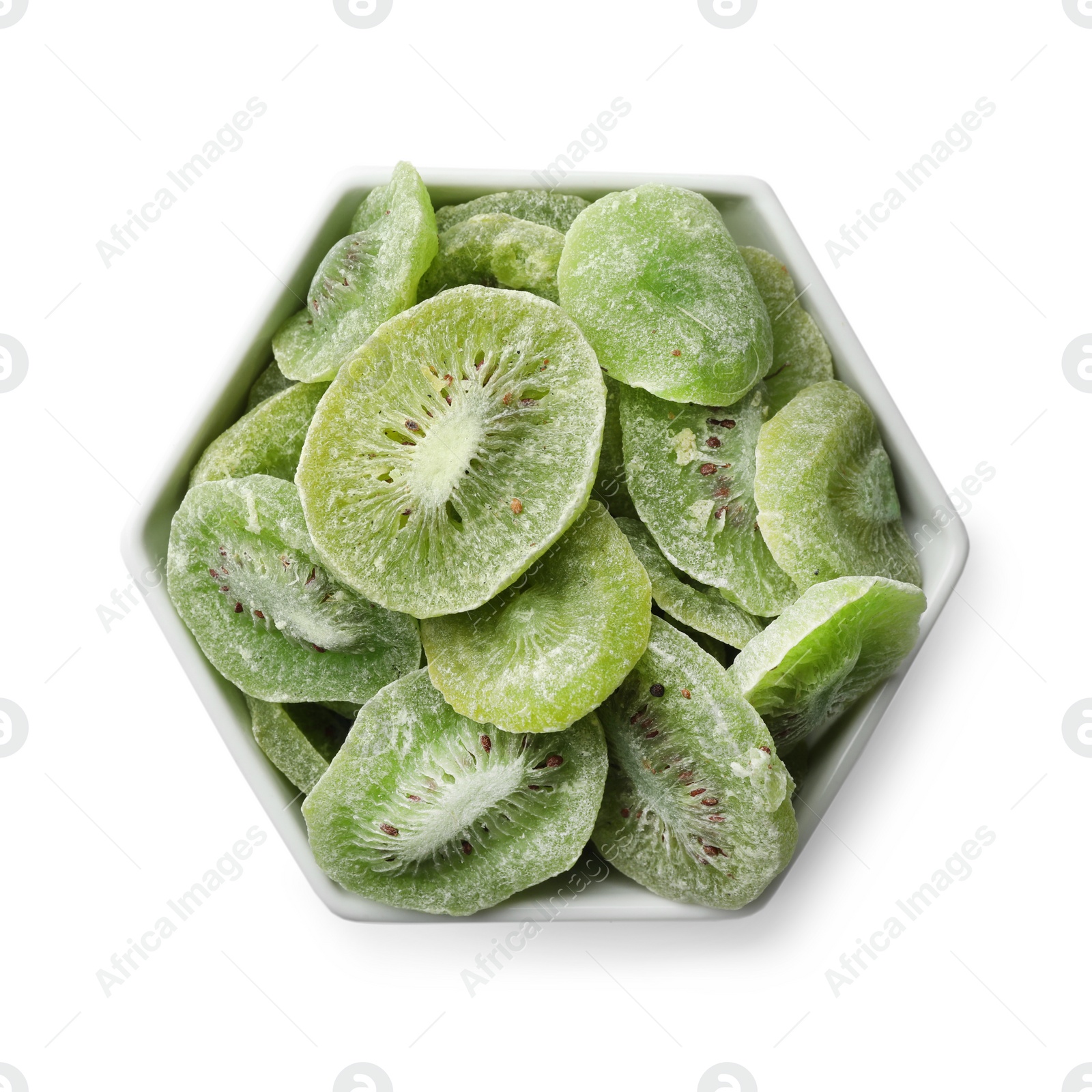 Photo of Bowl with slices of kiwi on white background, top view. Dried fruit as healthy food