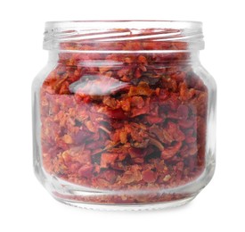 Photo of Aromatic spice. Red chili pepper flakes in jar isolated on white