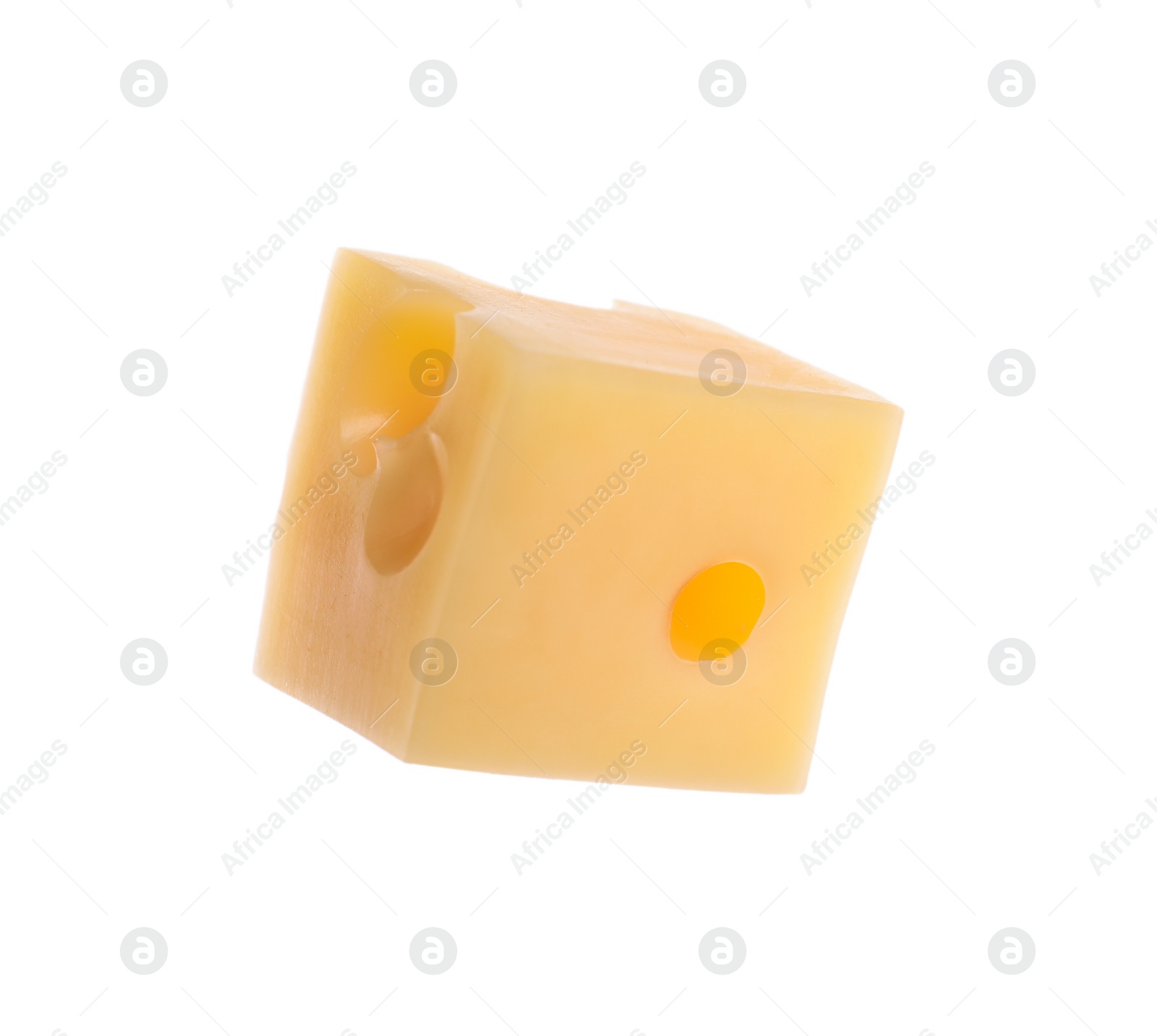 Photo of Piece of cheese with holes isolated on white