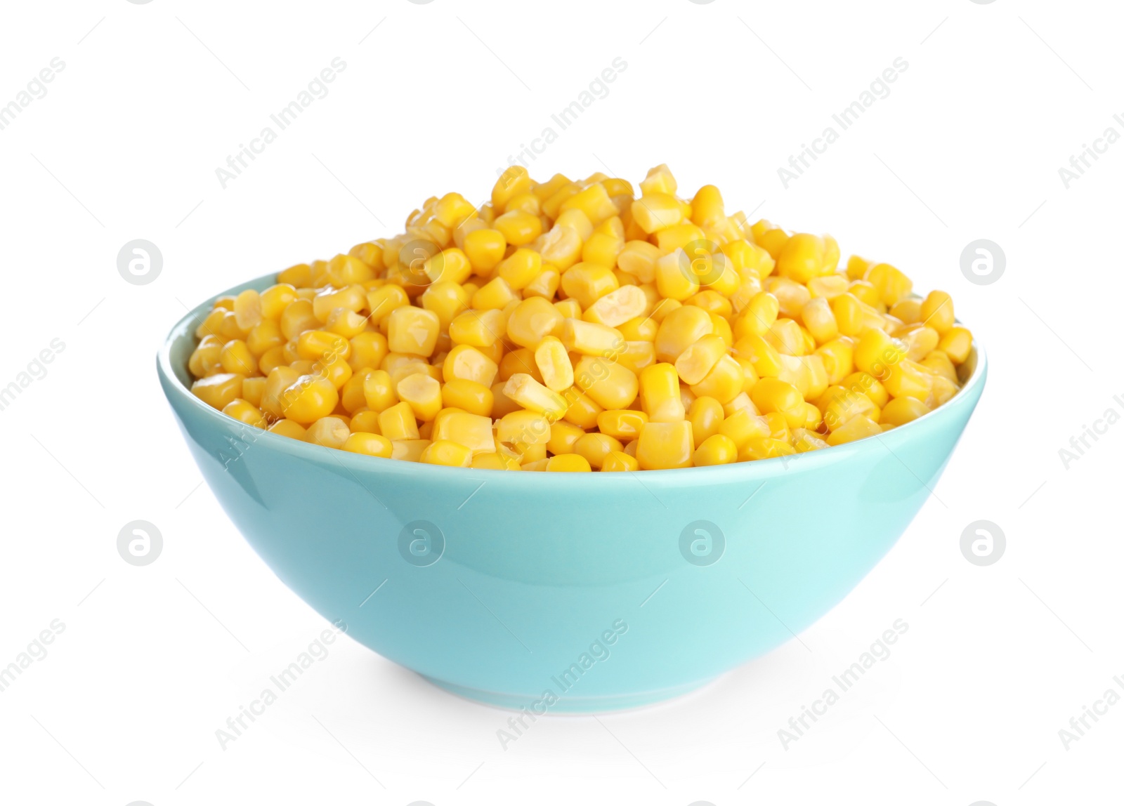 Photo of Delicious canned corn in bowl isolated on white