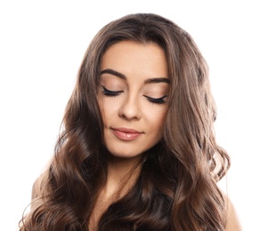 Beautiful woman with shiny wavy hair on white background