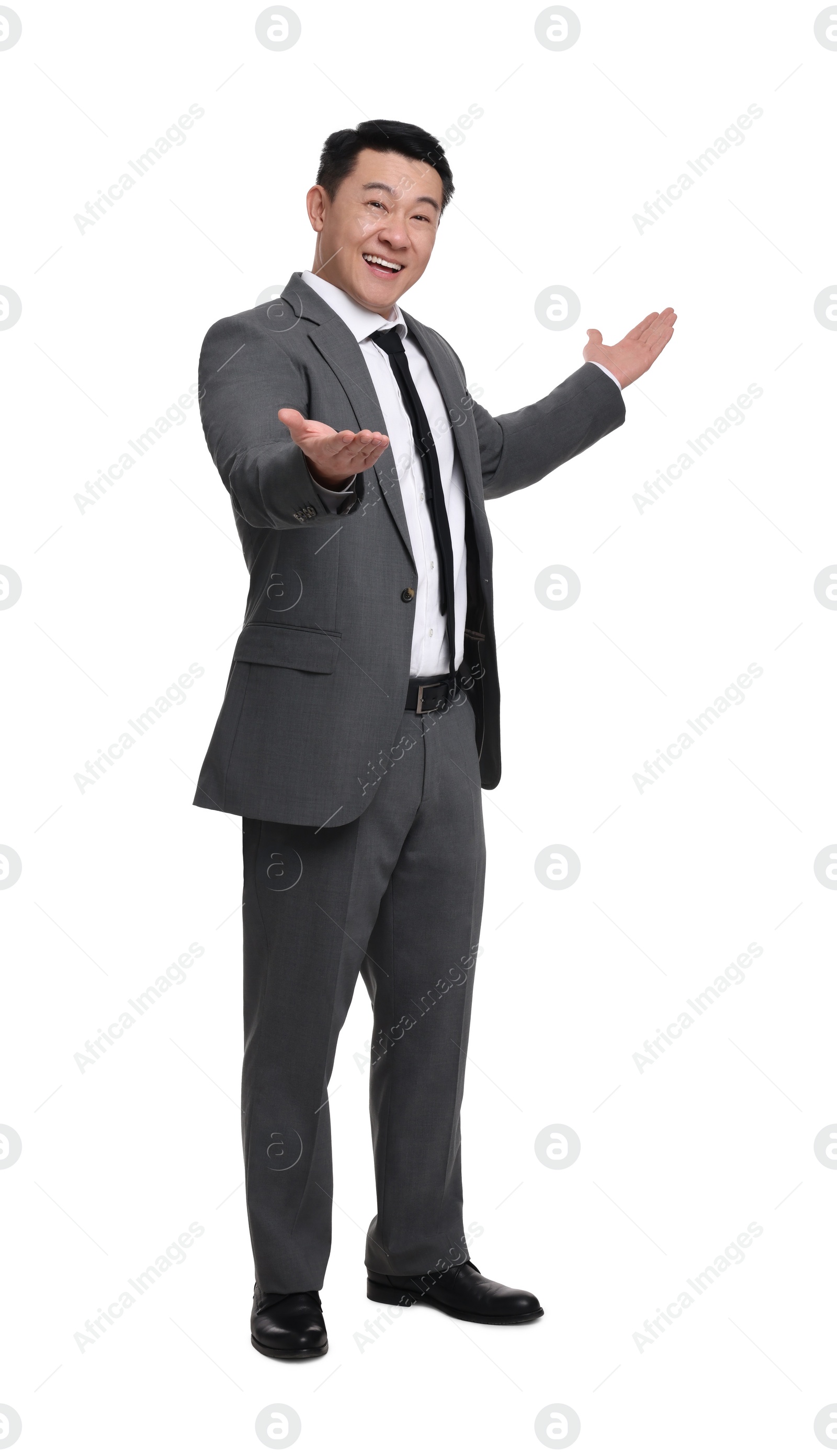 Photo of Businessman in suit posing on white background