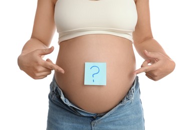 Pregnant woman with sticky note on belly against white background, closeup. Choosing baby name