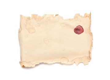 Photo of Sheet of old parchment paper with wax stamp isolated on white, top view. Space for design