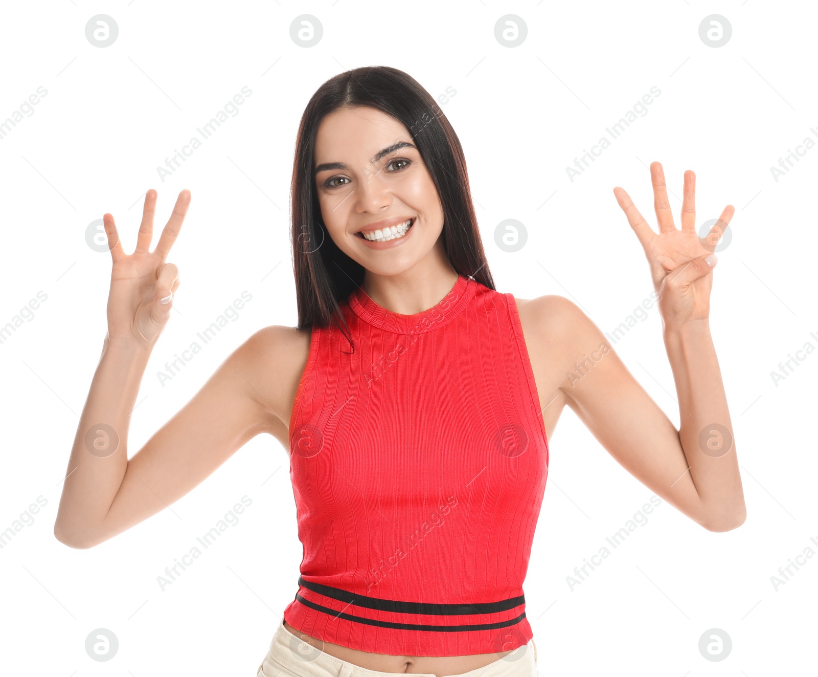 Photo of Woman showing number seven with her hands on white background