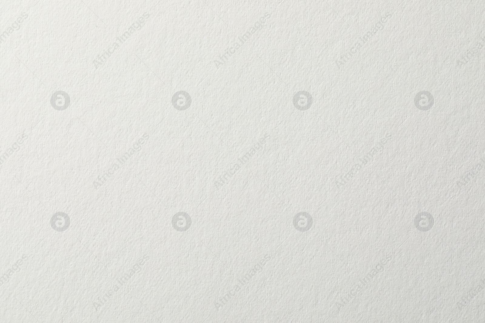 Photo of Texture of white paper sheet as background, closeup