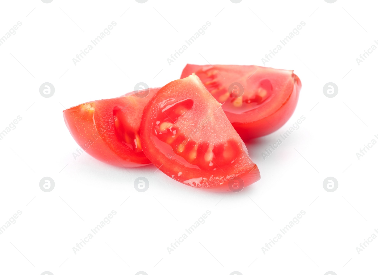 Photo of Cut red tomato on white background