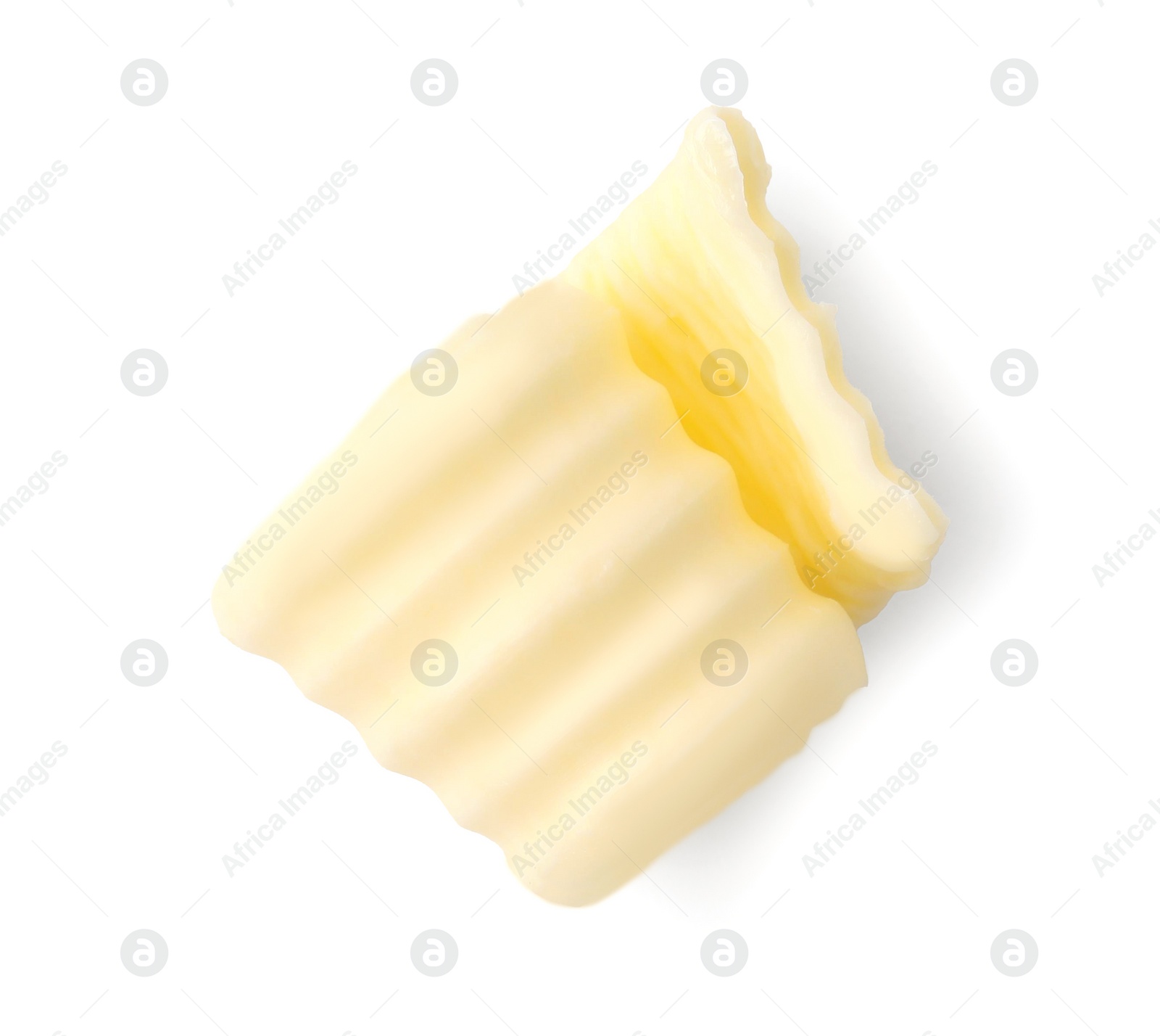 Photo of One tasty butter curl isolated on white, top view