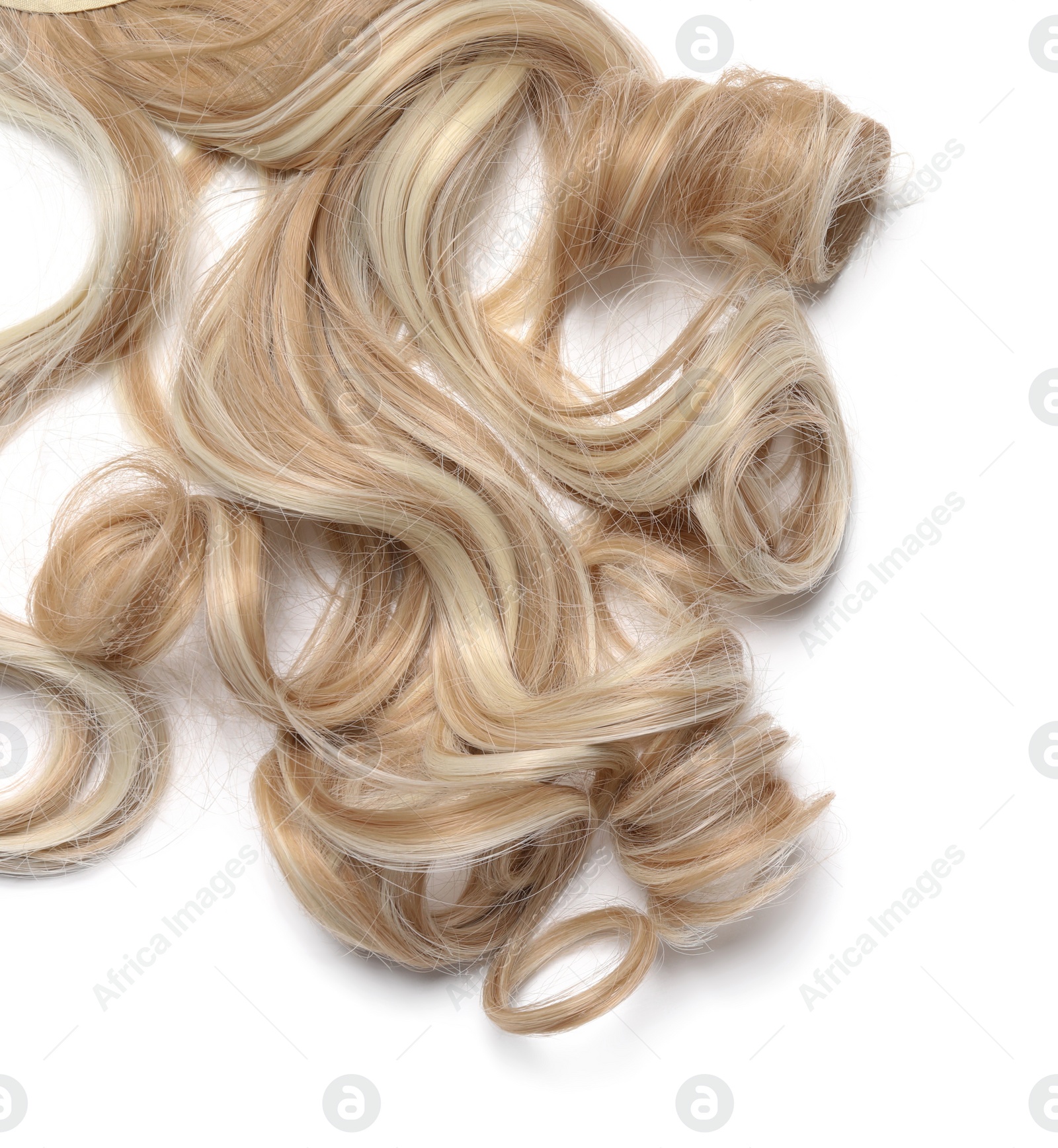 Photo of Beautiful blonde curly hair isolated on white, top view