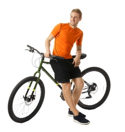 Young man in sportswear with bicycle on white background