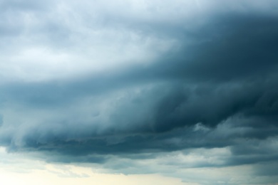 Sky with heavy rainy clouds on grey day