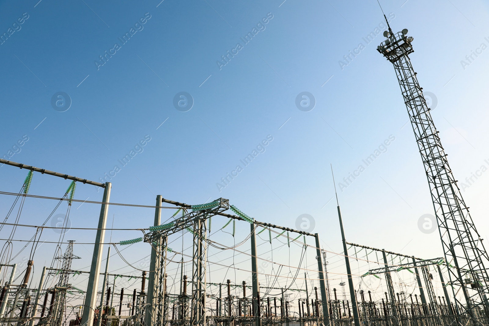 Photo of Modern electrical substation on sunny day, low angle view