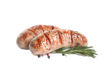 Photo of Grilled sausages and rosemary isolated on white